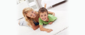 mom and son comfortable in living room