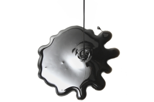 black liquid depicting oil leak