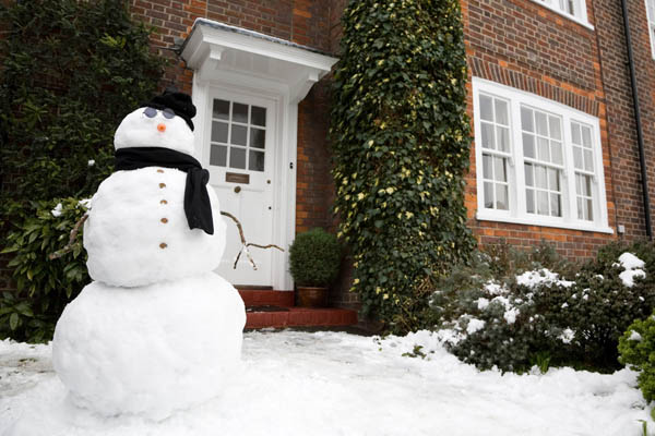 image of a house in winter depicting home heating