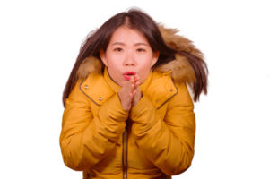 image of girl with blanket due to malfunctioning furnace