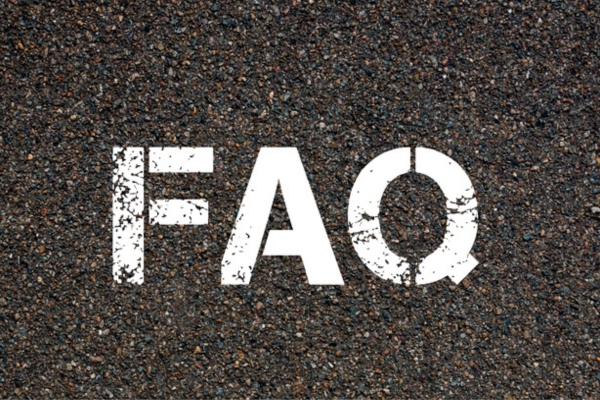 FAQ spray painted on concrete depicting questions about AC Refrigerant Leak