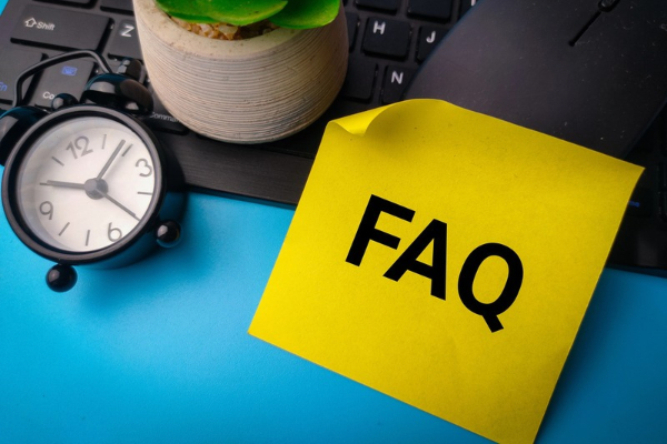FAQ written on a yellow sticky note depicting Boiler Repair Company questions