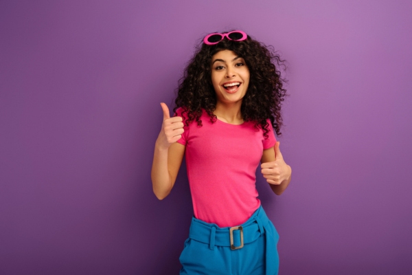 cheerful girl with two thumbs up depicting Understanding HVAC Systems