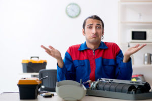 image of hvac contractor who is confused about air conditioner installation