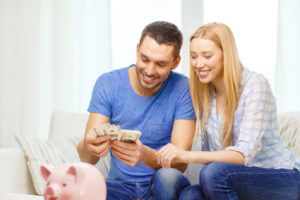 image of a couple saving money due to a furnace installation with a high efficiency afue rating