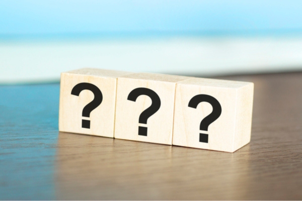 three question marks on wooden cubes depicting FAQs about Standby Generator