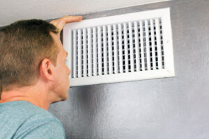image of a homeowner wondering wall vent open or closed