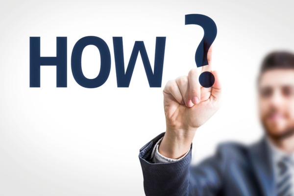 HOW written on a virtual board with a man blurred on the background depicting Reading Heating Oil Tank Gauge