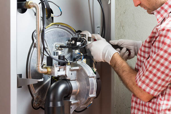 image of an oil boiler filter replacement and maintenance