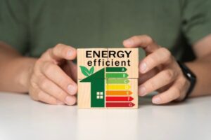 energy efficient meter on a wooden puzzle depicting new air conditioners