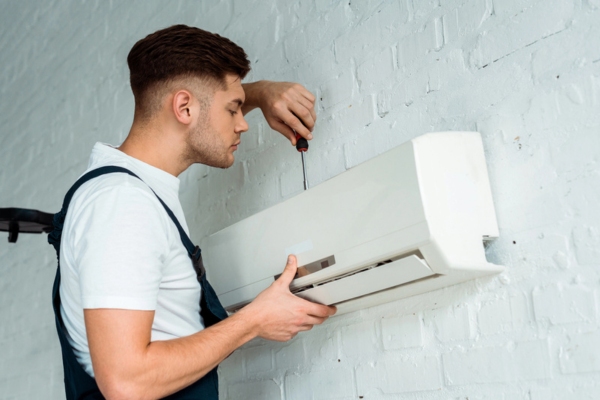 HVAC technician installing mini split hvac system