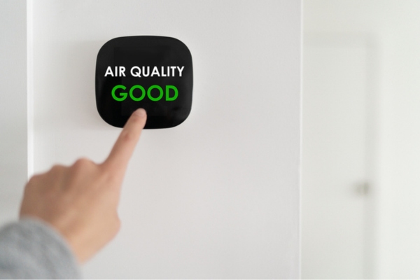 air quality smart monitor installed at home