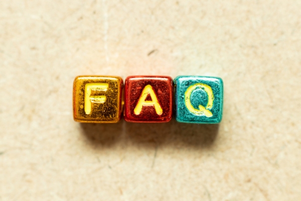 FAQ spelled using metallic letter beads depicting questions about oil efficiency
