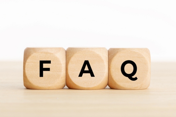 FAQ spelled using wooden letter cubes depicting Heating Oil Delivery Service questions