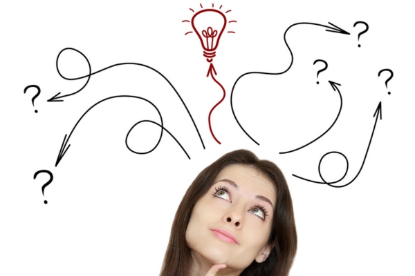 close up image of a thinking woman with doodles of arrows and idea bulb on top of head depicting Finding the Best Heating Solution