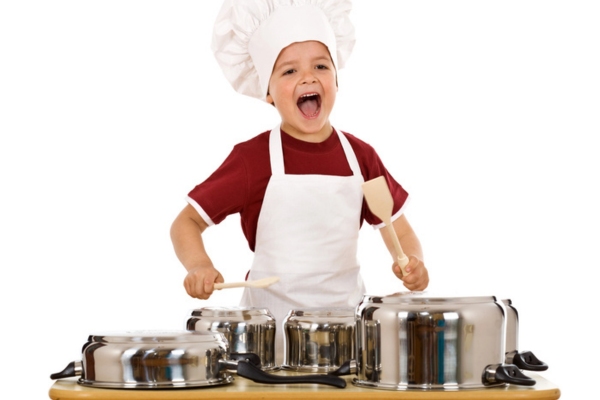 little kid banging pots and pans depicting furnace sounds