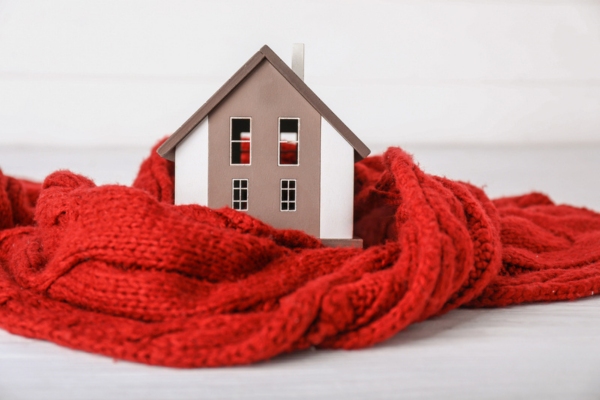 miniature house with a scarf