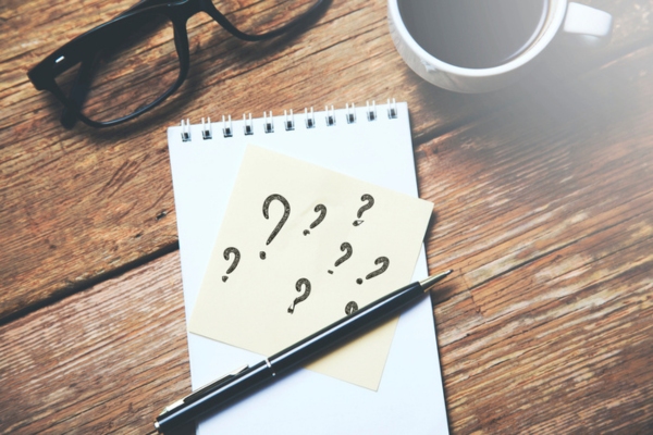 question marks doodled on a sticky note depicting HVAC Air Filter Replacement FAQs