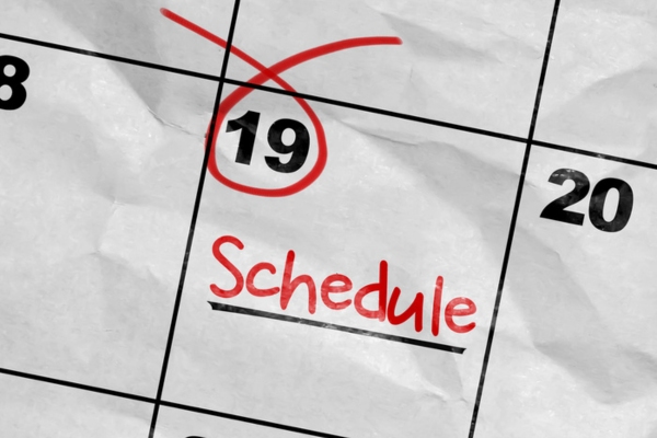 schedule written on an encircled date on a calendar depicting When to Think About Installing a Backup Generator