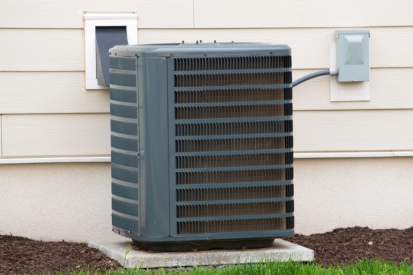 image of an air conditioning unit outside the house