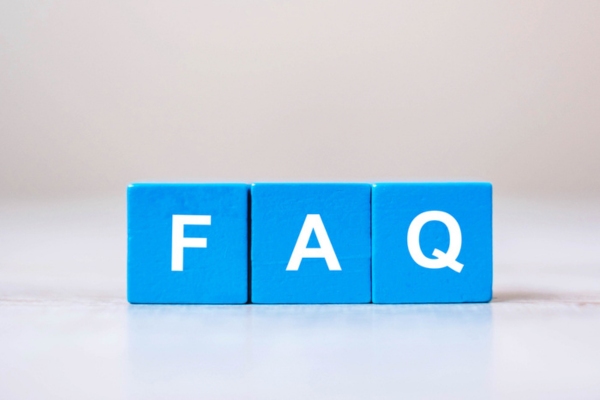 FAQ spelled using blue letter dice depicting Comfort Air Conditioner questions