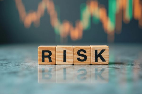 RISK spelled using wooden letter cubes depicting DIY HVAC Blower Motor Repairs